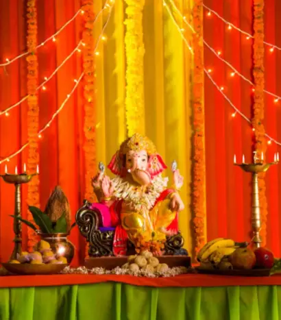 jpeg-optimizer_beautiful-clay-statue-idol-indian-hindu-god-lord-ganesha-decorated-with-colourful-drapery-marigold-garland-ganesh-chaturthi-festival-celebration-pooja_batcheditor_fotor